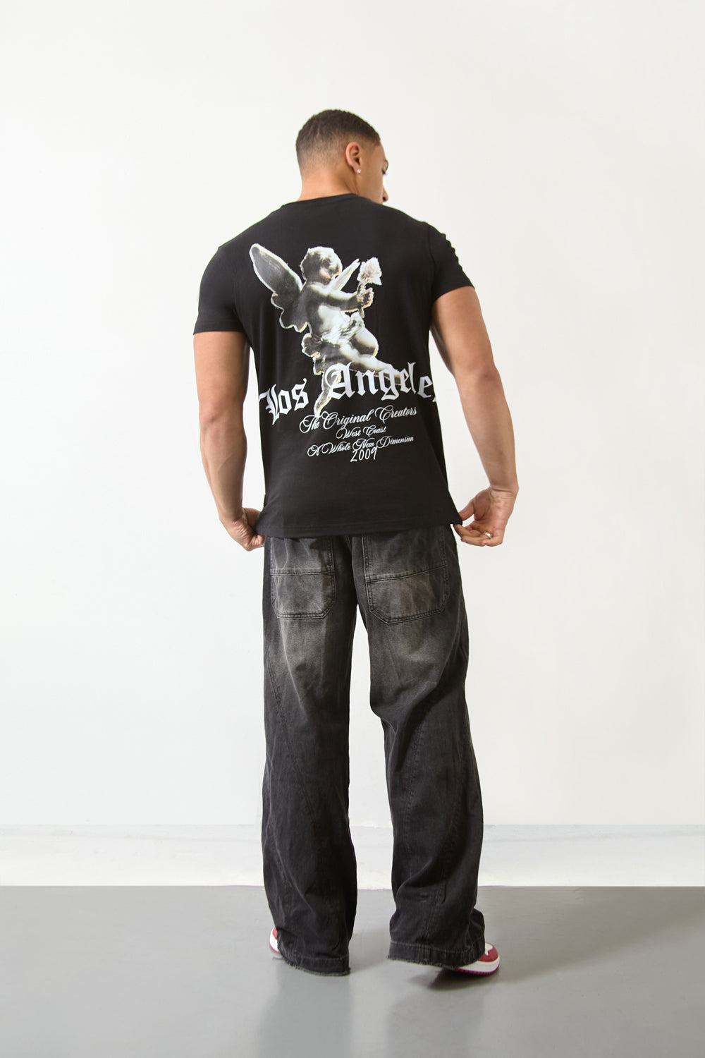 Los Angeles Cherub Graphic Regular Fit T-Shirt in Black - London Attitude