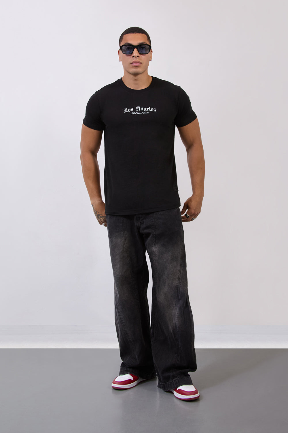 Los Angeles Cherub Graphic Regular Fit T-Shirt in Black - London Attitude