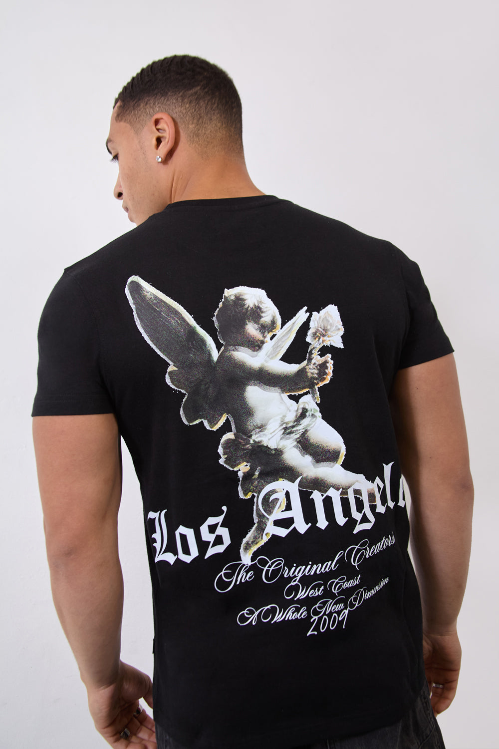 Los Angeles Cherub Graphic Regular Fit T-Shirt in Black - London Attitude